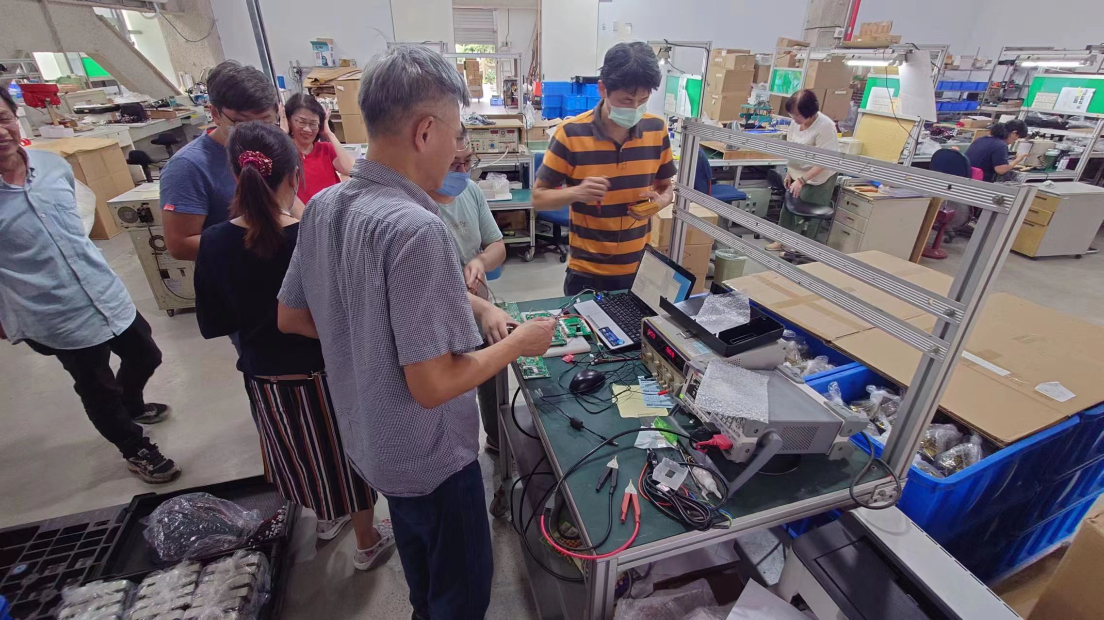 Production end-of-line test fixture for power electronics